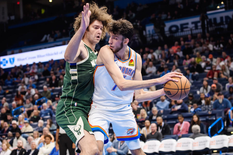 Oct 17, 2023; Oklahoma City, Oklahoma, USA; Oklahoma City Thunder forward Chet Holmgren (7) fights for position while defended by Milwaukee Bucks center <a class="link " href="https://sports.yahoo.com/nba/players/4477" data-i13n="sec:content-canvas;subsec:anchor_text;elm:context_link" data-ylk="slk:Robin Lopez;sec:content-canvas;subsec:anchor_text;elm:context_link;itc:0">Robin Lopez</a> (42) during the first half at Paycom Center. Mandatory Credit: Rob Ferguson-USA TODAY Sports