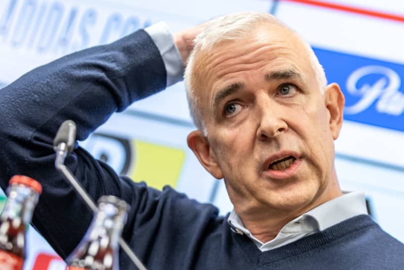 Dirk Zingler, President of Bundesliga soccer club 1. FC Union Berlin, speaks at a press conference. Zingler has said the club is open for investors in general and told fans that blaming the German Football League (DFL) over the issue was wrong. Andreas Gora/dpa