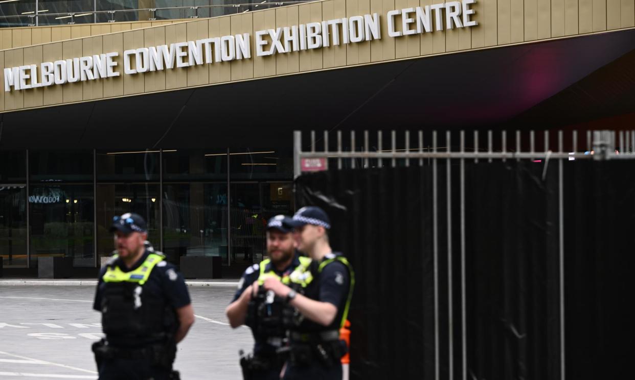 <span>Victoria police patrol the area near the upcoming Land Forces 2024 expo. Protesters plan to form a large picket line around the event.</span><span>Photograph: Joel Carrett/EPA</span>