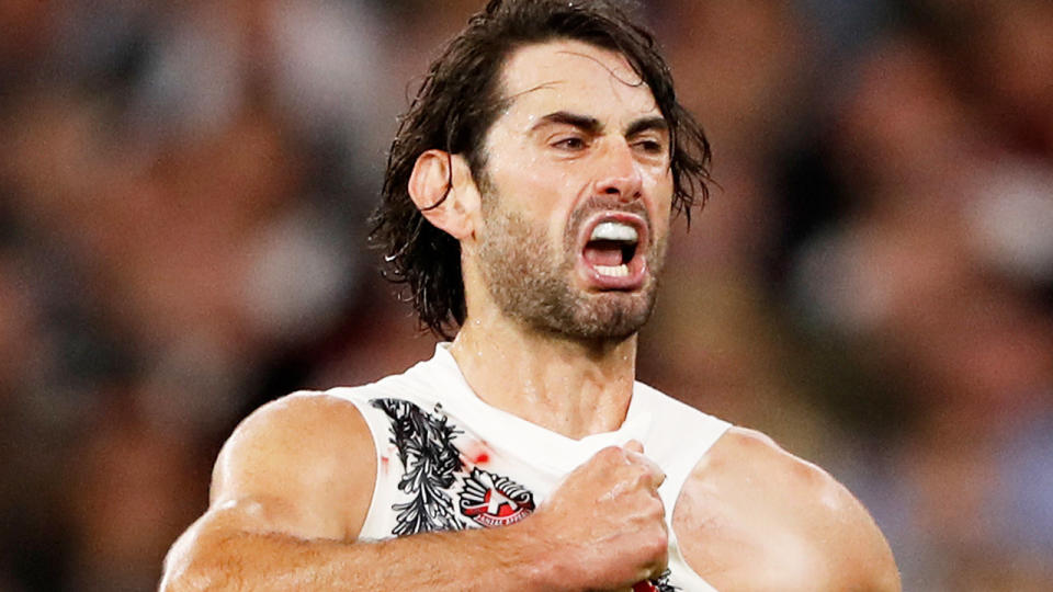 Brodie Grundy celebrates after kicking a goal for Collingwood.