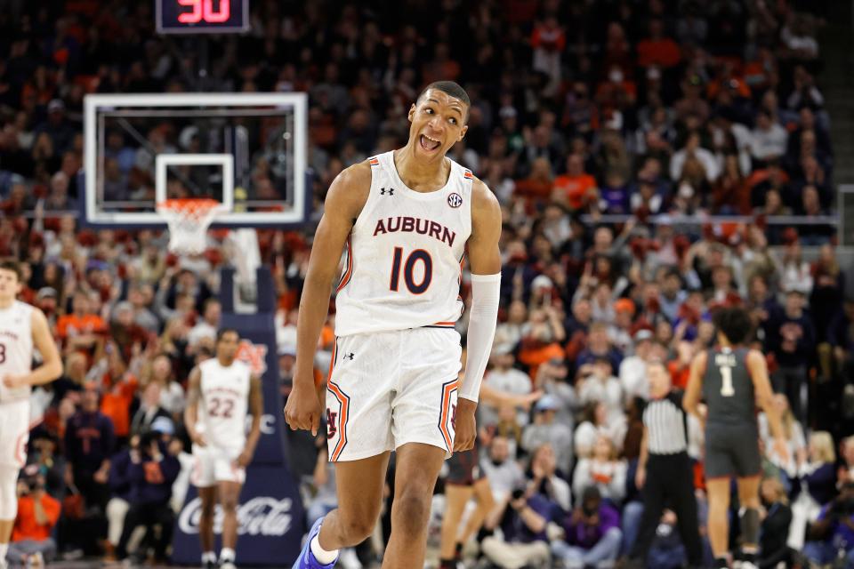 Auburn forward Jabari Smith (10) celebrates after making a 3-point shot against Oklahoma during the first half of an 86-68 win Saturday.