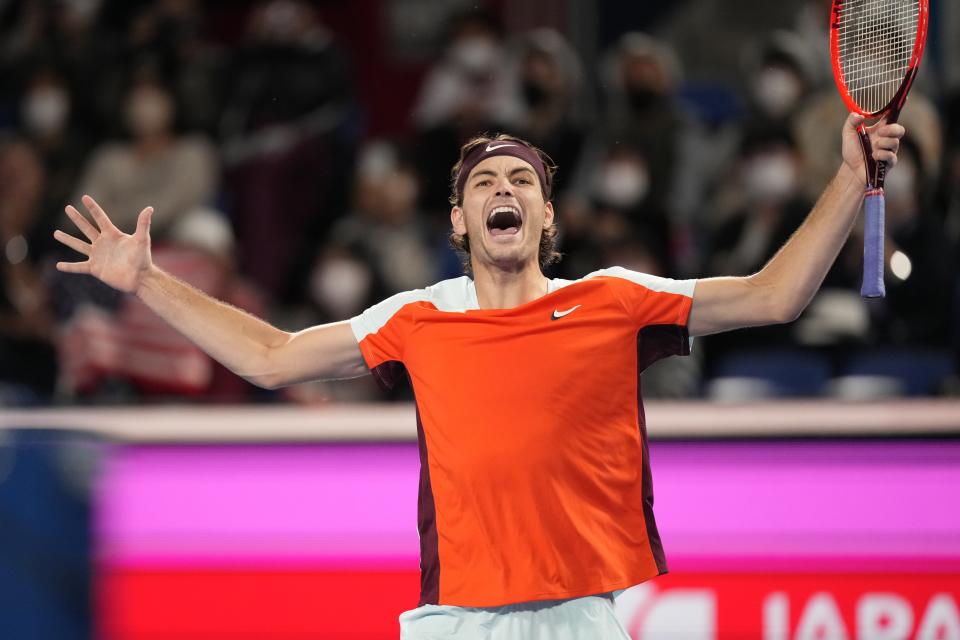 Taylor Fritz of the U.S. reacts as he defeated Denis Shapovalov of Canada in their semifinal match in the Japan Open tennis championships in Tokyo, Saturday, Oct. 8, 2022. (AP Photo/Hiro Komae)