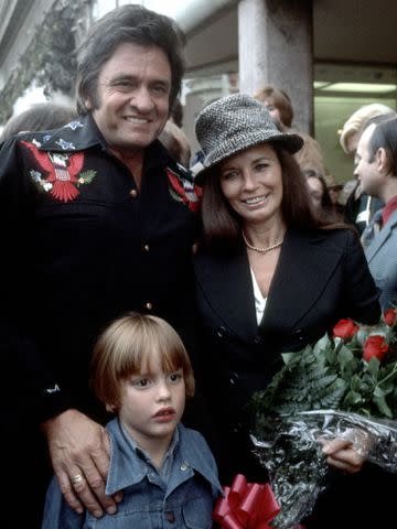 <p>Ron Galella/Ron Galella Collection/Getty</p> Johnny Cash, June Carter Cash and their son.