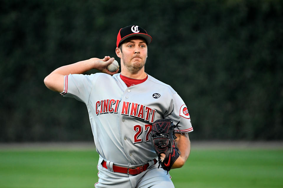 Trevor Bauer #27 of the Cincinnati Reds warms up before the game against the Chicago Cubs at Wrigley Field on September 18, 2019 in Chicago, Illinois. (Photo by Quinn Harris/Getty Images)