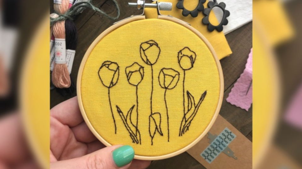 An embroidery hoop will make it easier for you to sew a clean, cute pattern.