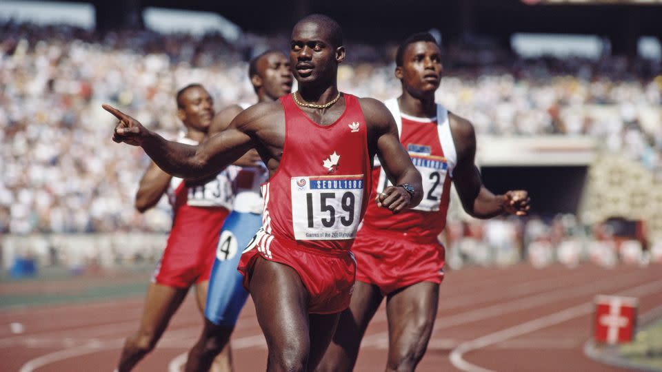 Canadian Ben Johnson celebrates winning gold in the men's 100m final on 24 September 1988 during the Olympic Games at the Seoul Olympic Stadium in Seoul, South Korea. Johnson was later disqualified for the illegal use of performance enhancing drugs. - Mike Powell/Getty Images