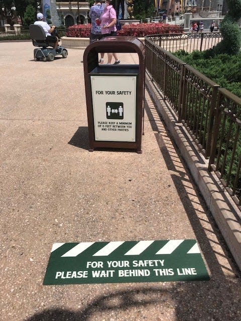 SIgns, signs: Everywhere, signs about safety at Magic Kingdom, as the park opens Thursday and Friday for a passholder preview before its reopening to the public Saturday.