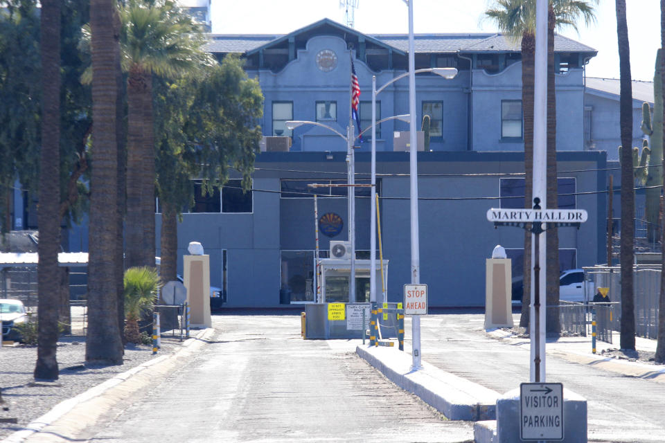 The main entrance to the Arizona State Prison Complex-Florence shown, in Florence, Ariz., on Wednesday, Nov. 16, 2022, shortly after prisoner Murray Hooper was executed in the facility's death chamber for the murders of a man and woman in 1980. The execution was the third of the year at the prison. (AP Photo/Bob Christie)