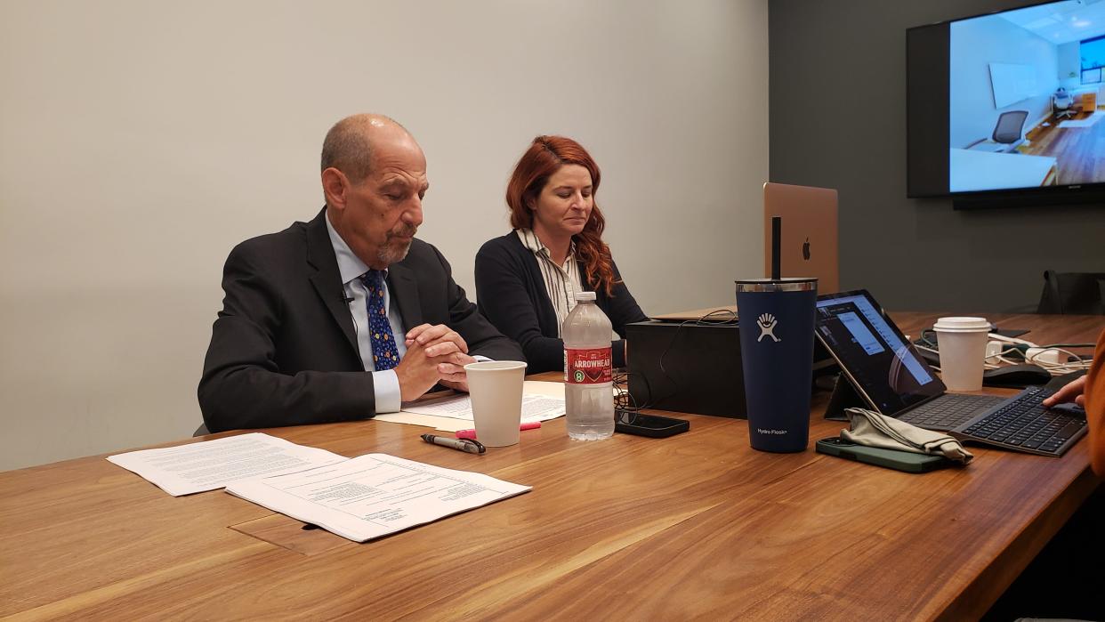 Jennifer Christiansen Vurno, right, sits with her attorney Paul Mones during a news conference Wednesday in Culver City detailing her civil lawsuit filed against The Thacher School in Ojai.