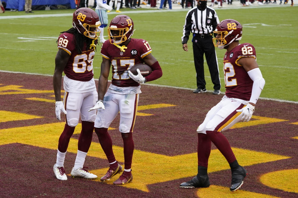 Washington Football Team wide receiver Terry McLaurin (17) celebrates his touchdown with teammates wide receiver Cam Sims (89) and tight end Logan Thomas (82) in the first half of an NFL football game against Dallas Cowboys, Sunday, Oct. 25, 2020, in Landover, Md. (AP Photo/Patrick Semansky)