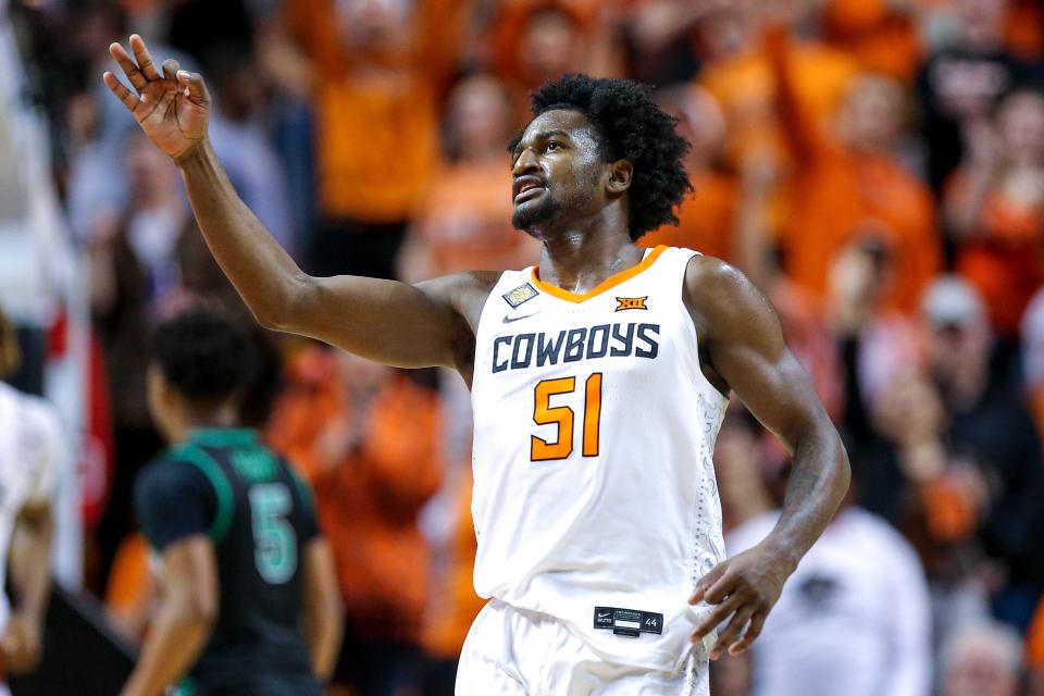 Oklahoma State guard John-Michael Wright (51) celebrates after shooting three ˜in the second half during a college basketball game in the quarterfinals of the National Invitational Tournament between the Oklahoma State Cowboys (OSU) and the North Texas Mean Green at Gallagher-Iba Arena in Stillwater, Okla., Tuesday, March 21, 2023.