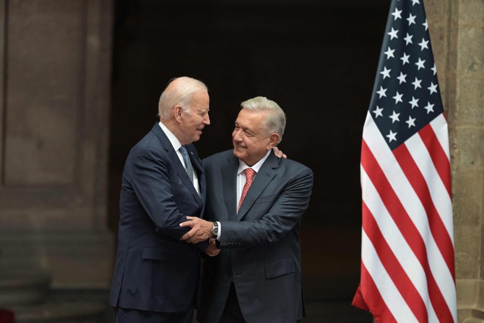 US President Joe Biden (L) shakes hands with his Mexican counterpart Andres Manuel Lopez Obrador during a welcome ceremony at Palacio Nacional (National Palace) in Mexico City, on January 9, 2023.