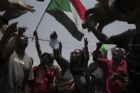 Sudanese anti-military protesters march in demonstrations in the capital of Sudan, Khartoum, on Thursday, June 30, 2022. A Sudanese medical group says at least seven people were killed on Thursday in the anti-coup rallies during which security forces fired on protesters denouncing the country’s military rulers and demanding an immediate transfer of power to civilians. (AP Photo/Marwan Ali)