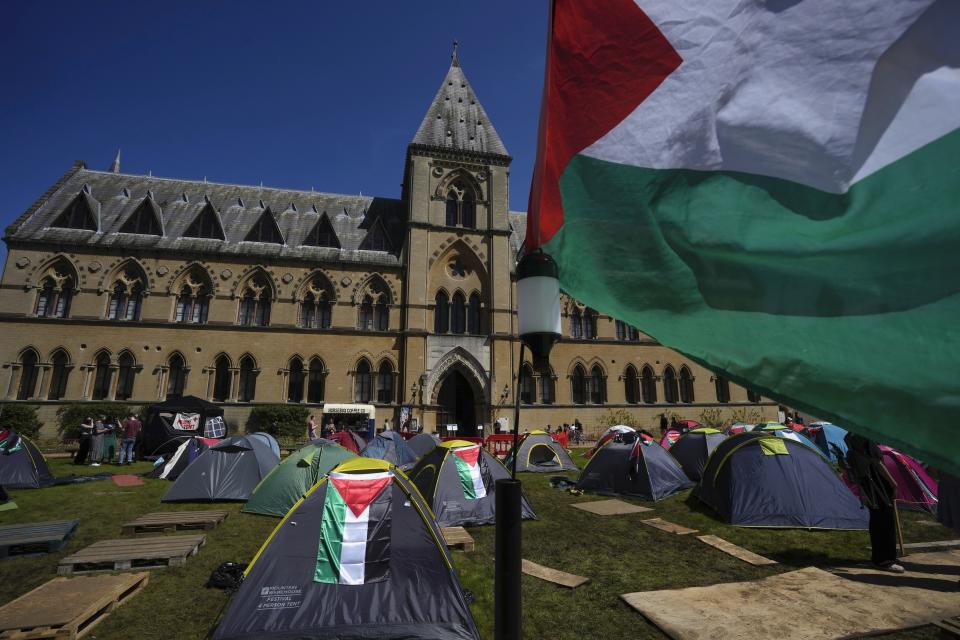 Tents are set up by pro-Palestinians students outside the Pitt Rivers Museum at Oxford, in England, Thursday, May 9, 2024. Students in the UK, including in Leeds, Newcastle and Bristol, have set up tents outside university buildings, replicating the nationwide campus demonstrations which began in the US last month. (AP Photo/Kin Cheung)