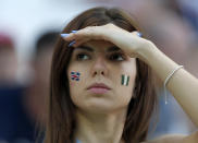 <p>A fan shows her support with face paint </p>