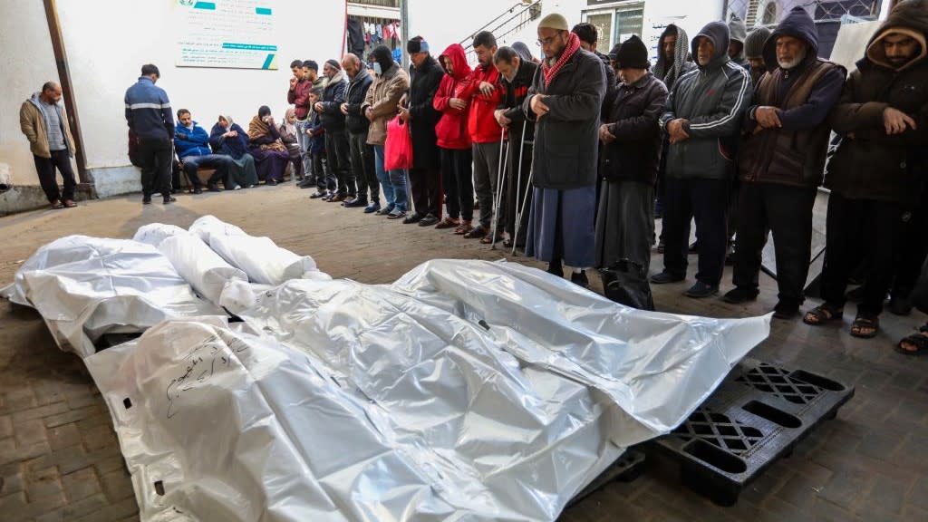  Body bags laid in the street in Rafah, Gaza. 