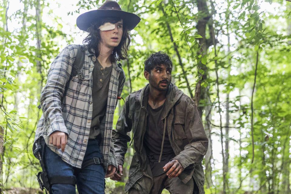 Chandler Riggs as Carl Grimes, left, and Avi Nash as Siddiq in <i>The Walking Dead</i>. (Photo: Jackson Lee Davis/AMC)