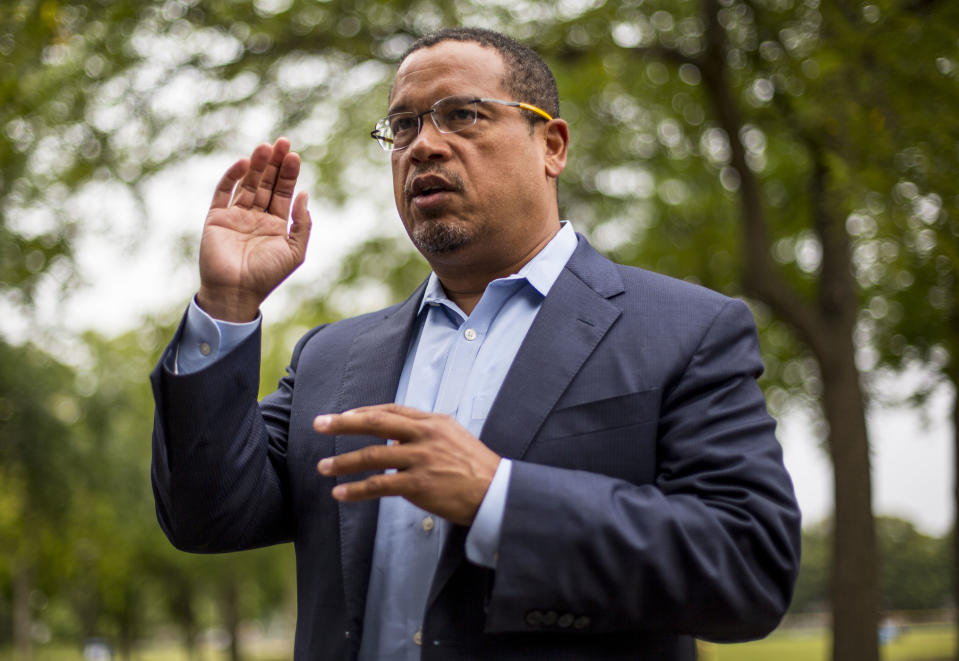 Rep. Keith Ellison addresses his campaign volunteers and supporters before sending them off on a door knocking campaign, Friday, Aug. 17, 2017 in Minneapolis. Minnesota Rep. Keith Ellison said Friday he won't abandon his campaign for attorney general amid allegations that he once physically abused an ex-girlfriend and said if she claims to have a video of the incident she should produce it. (Alex Kormann/Star Tribune via AP)