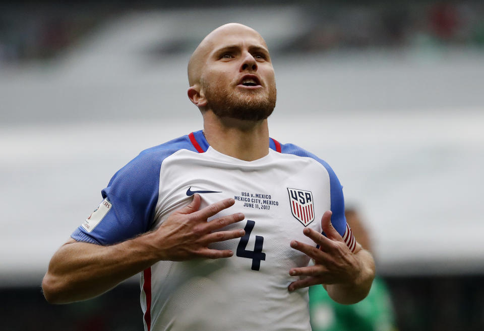 FILE - In this June 11, 2017, file photo, United States' Michael Bradley celebrates after scoring against Mexico during a World Cup soccer qualifying match in Mexico City. Midfielder Michael Bradley and goalkeeper Brad Guzan will be back with the U.S. national team for the first time since the loss at Trinidad and Tobago last October that ended the Americans' streak of seven straight World Cup appearances. (AP Photo/Eduardo Verdugo, File)