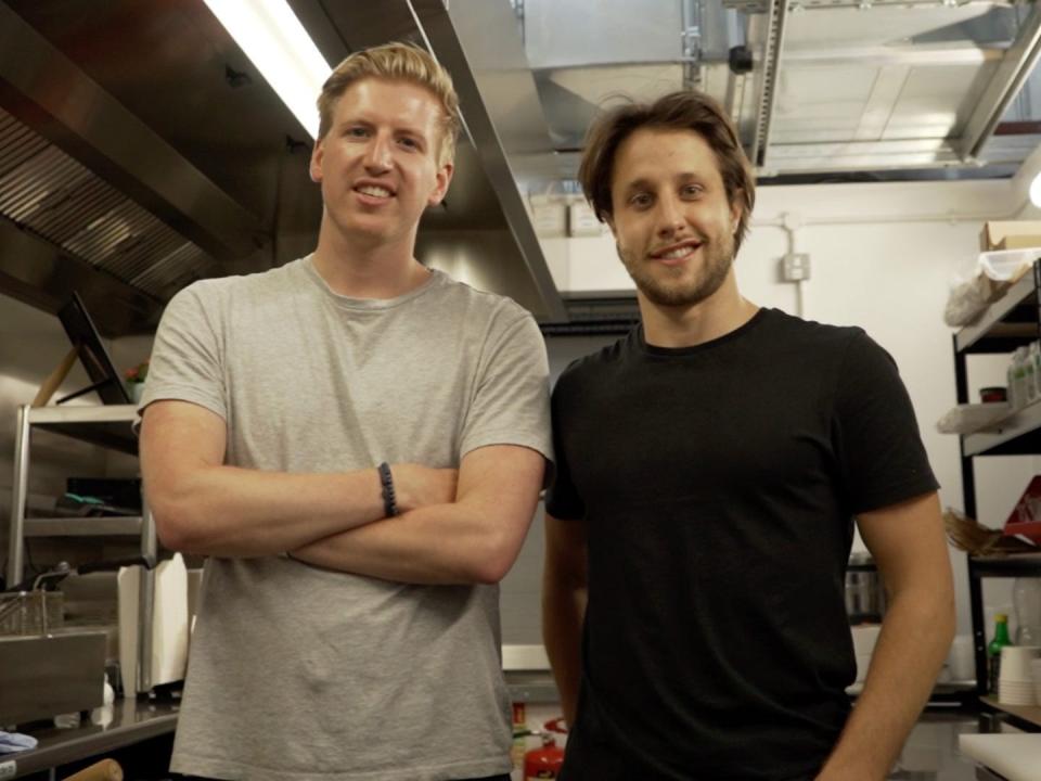 Growth Kitchen founders Tom Gatz and Mate Kun stand in a kitchen