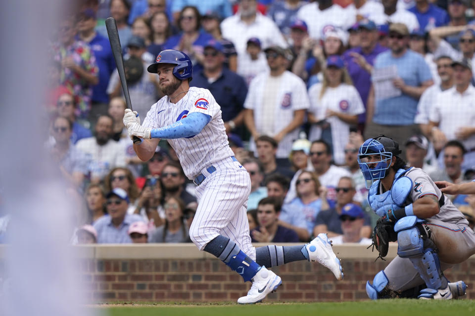 Chicago Cubs' Patrick Wisdom watches after hitting a single during the fifth inning of a baseball game against the Miami Marlins in Chicago, Sunday, June 20, 2021. (AP Photo/Nam Y. Huh)