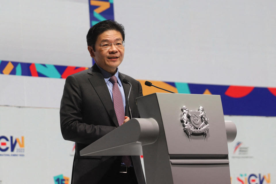 Singapore's Deputy Prime Minister and Minister for Finance Lawrence Wong delivers the Singapore Energy Lecture during the 15th Singapore International Energy Week in Singapore, illustrating a story on Budget 2024.