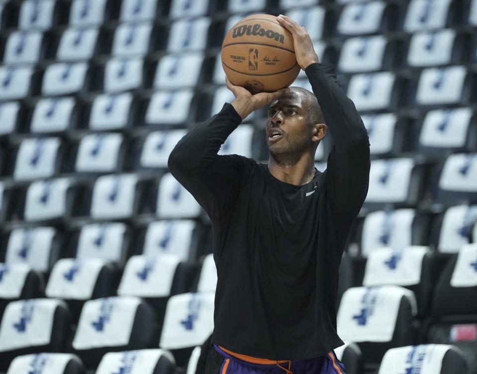 Phoenix Suns guard Chris Paul works out before the Western Conference semifinals against the Denver Nuggets at Ball Arena in Denver on May 9, 2023. Paul has been out with an injury.