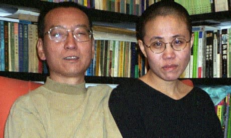 Chinese dissident Liu Xiaobo (L) and his wife Liu Xia