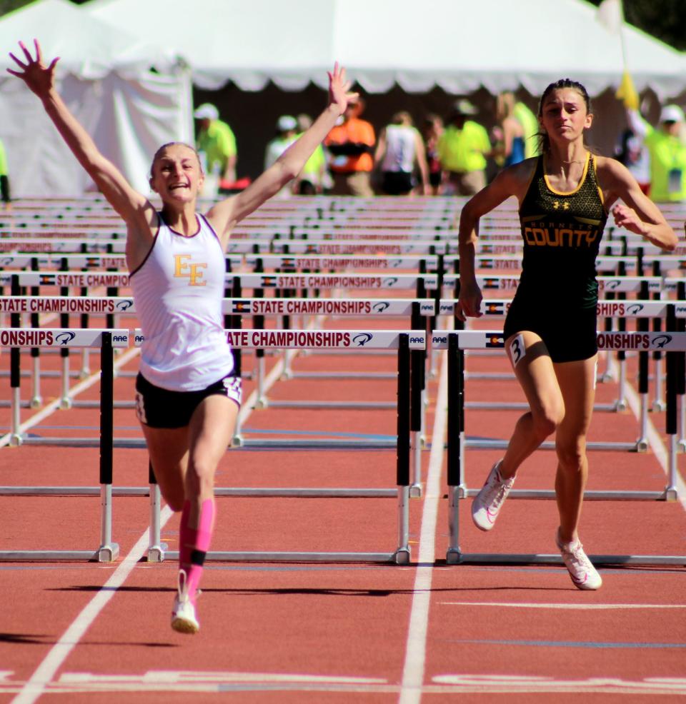 Pueblo East Reagan Falletta (left) celebrates as she crosses the finish line of the girls Class 4A 100m dash with fellow Pueblo athlete Delaney Pighetti of Pueblo County during day three of the CHSAA track and field state finals held at Jeffco Stadium on May 18, 2024.
