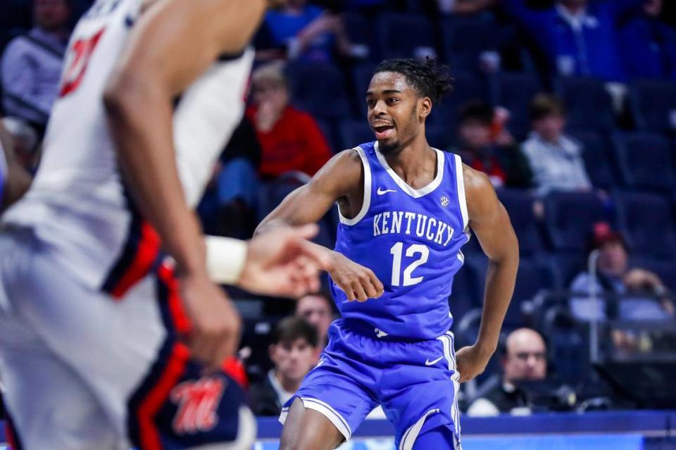 Kentucky’s Antonio Reeves (12) celebrates after scoring against Mississippi during Tuesday’s game in Oxford, Miss. Reeves came off the bench to lead UK with 27 points.