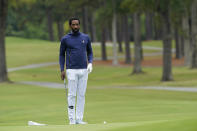 North Carolina A&T's J.R. Smith lines up his shot on the 17th green during the first round of the Phoenix Invitational golf tournament in Burlington, N.C., Monday, Oct. 11, 2021. Smith, who spent 16 years in the NBA made his college golfing debut in the tournament hosted by Elon. (AP Photo/Gerry Broome)