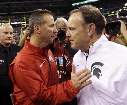 Urban Meyer (L) and Mark Dantonio meet Saturday in a game with conference and potential CFP implications. 