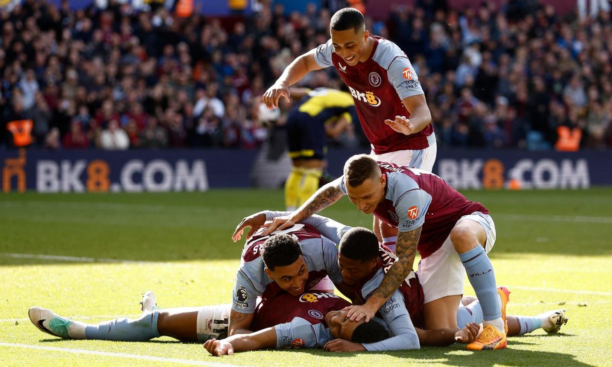 <span>Aston Villa players celebrate Ollie Watkins’ role in their third goal.</span><span>Photograph: Jason Cairnduff/Action Images/Reuters</span>
