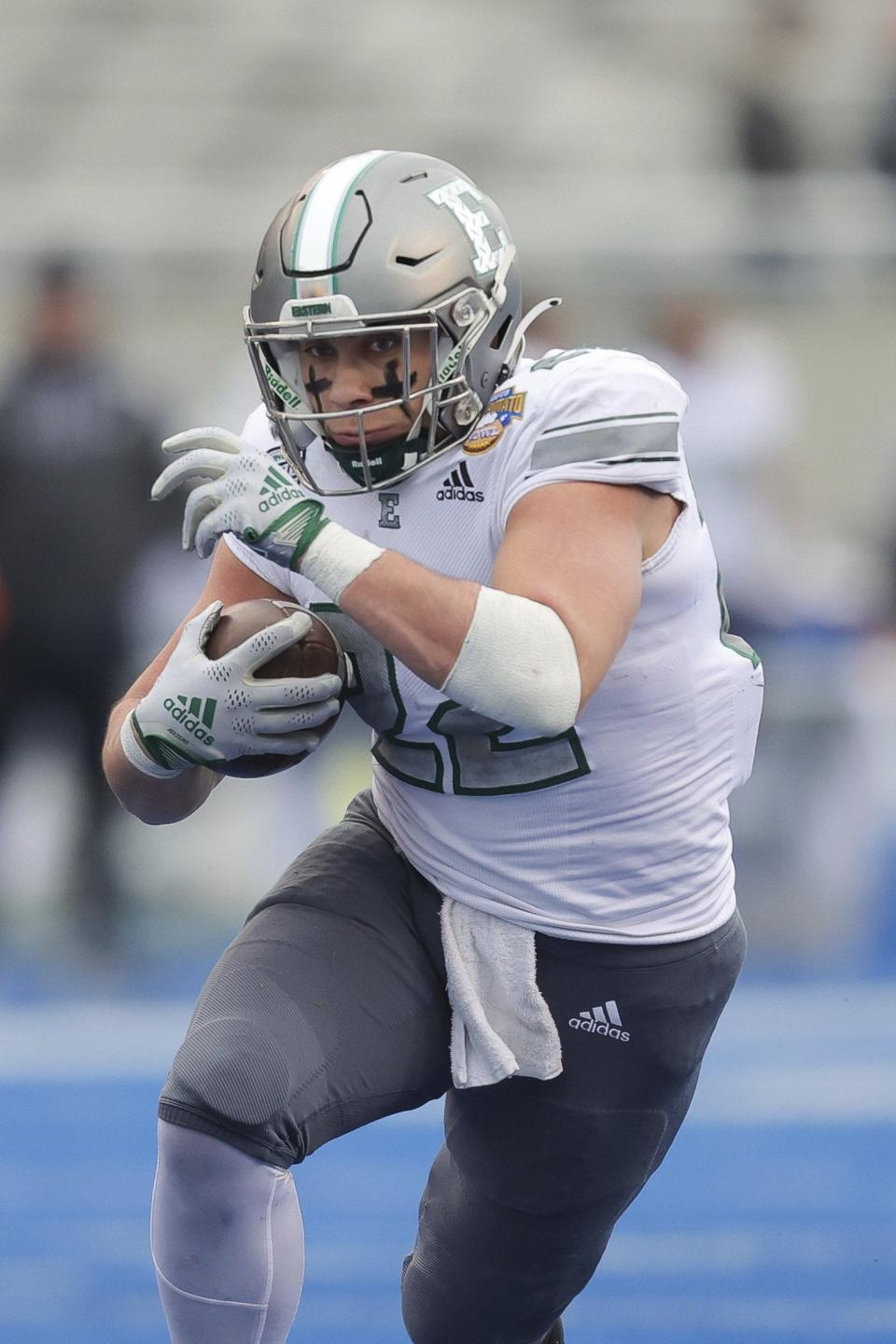 Eastern Michigan running back Samson Evans (22) runs with the ball against San Jose State in the first half of the Idaho Potato Bowl NCAA college football game, Tuesday, Dec. 20, 2022, in Boise, Idaho.