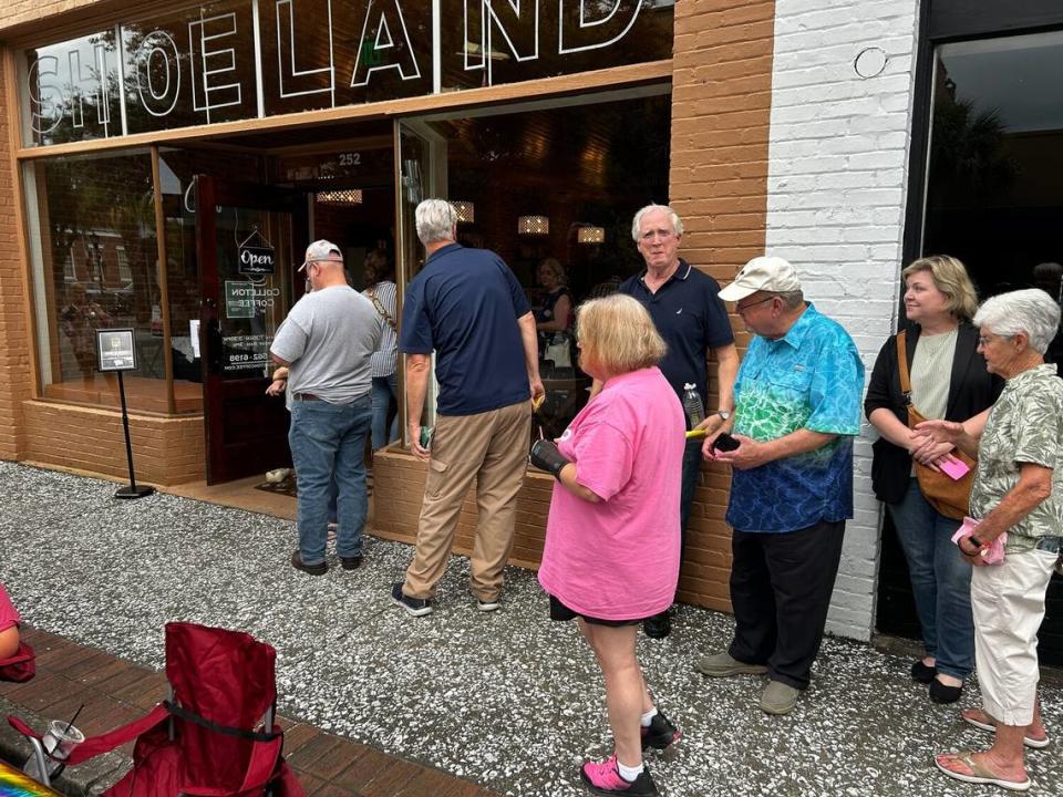 A line snakes out the door for Becky Hill’s book signing at Colleton Coffee Aug. 11, 2023.