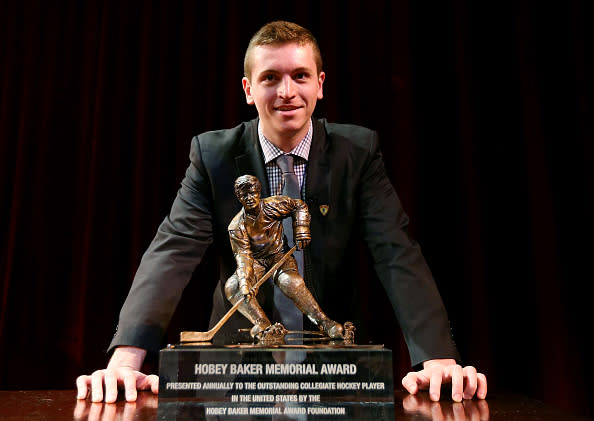 TAMPA, FLORIDA - APRIL 08: Jimmy Vesey of Harvard University and Hobey Baker Award winner poses with the trophy after the 2016 Hobey Baker Memorial Award ceremony at Tampa Theatre on April 8, 2016 in Tampa, Florida.The Hobey Baker Award is given to college hockey's best player. (Photo by Elsa/Getty Images)