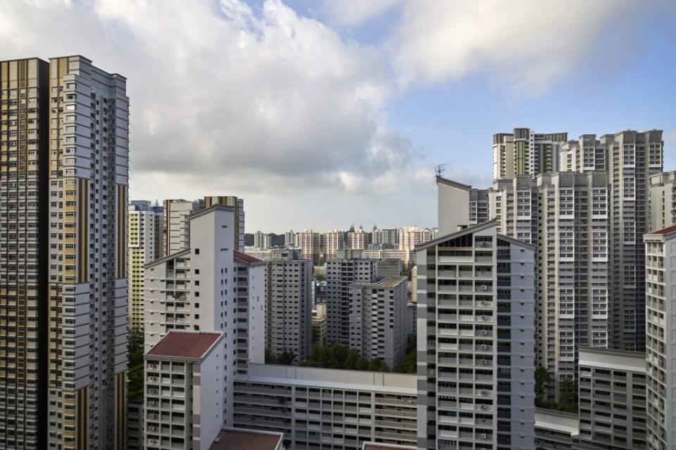 Housing & Development Board (HDB) public housing apartment blocks in Singapore, on Tuesday, April 13, 2021. Singapores central bank kept key policy settings unchanged as the city-state sees a brighter economic rebound amid a firming global recovery. The decision was announced at the same time as government data showing gross domestic product in the first quarter grew 0.2% from a year ago, after falling 2.4% in the previous three months. Photographer: Lauryn Ishak/Bloomberg via Getty Images