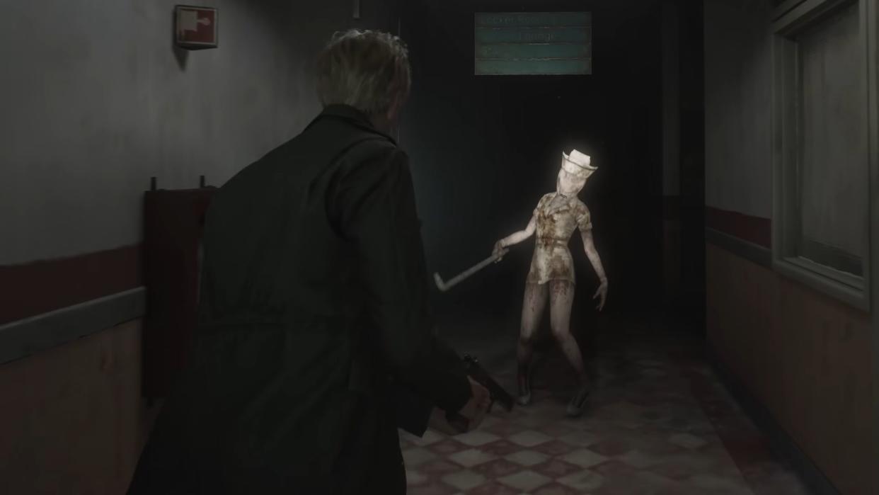  James draws a handgun as a nurse walks down a dark hallway. 