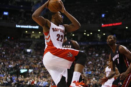 Nov 29, 2013; Toronto, Ontario, CAN; Toronto Raptors forward Rudy Gay (22) goes up to shoot as Miami Heat center-forward Chris Bosh (1) looks on at the Air Canada Centre. Miami defeated Toronto 90-83. Mandatory Credit: John E. Sokolowski-USA TODAY Sports