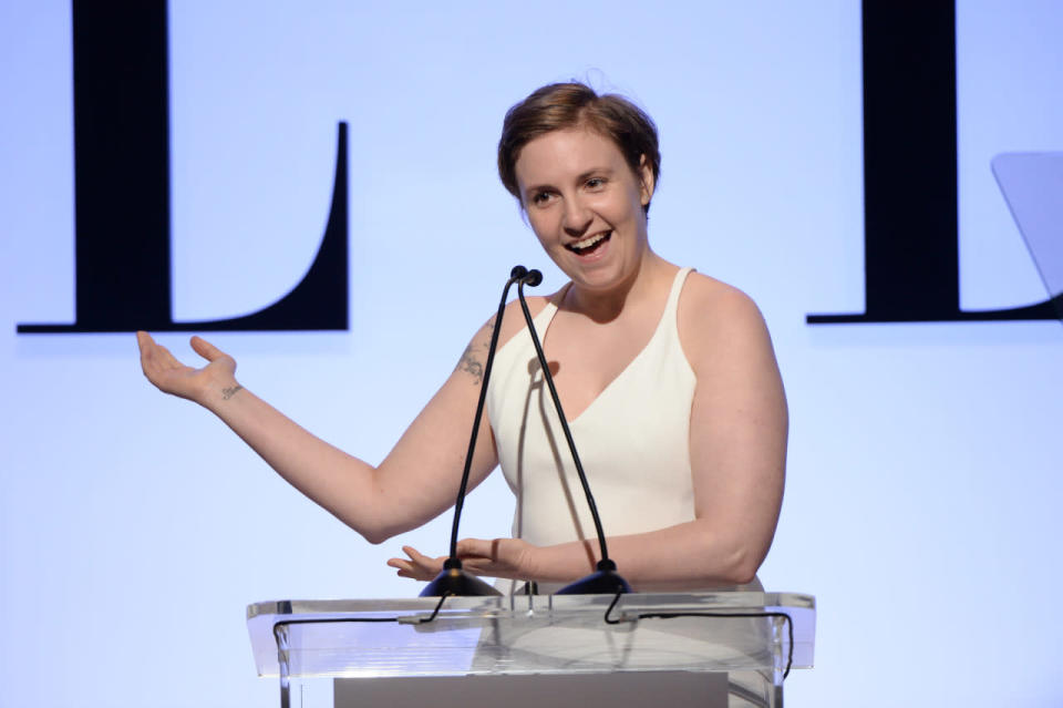 Lena Dunham in a white Calvin Klein dress at the ELLE Women in Hollywood Awards.