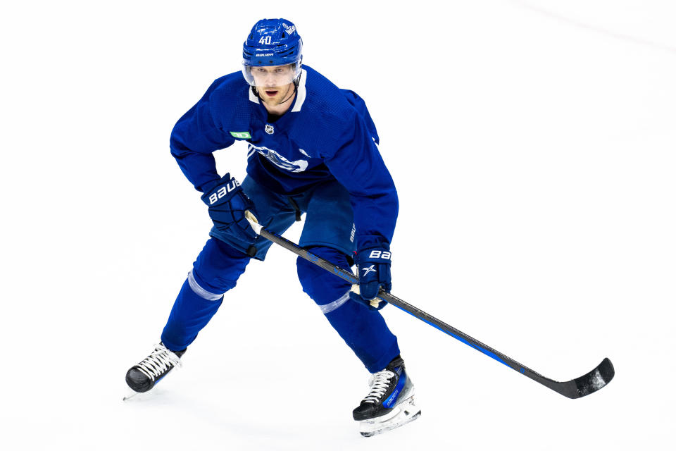 Vancouver Canucks' Elias Pettersson skates during an NHL hockey practice in Vancouver, British Columbia on Saturday, March 2, 2024. Pettersson resigned to the team with an eight year contract extension. (Ethan Cairns/The Canadian Press via AP)