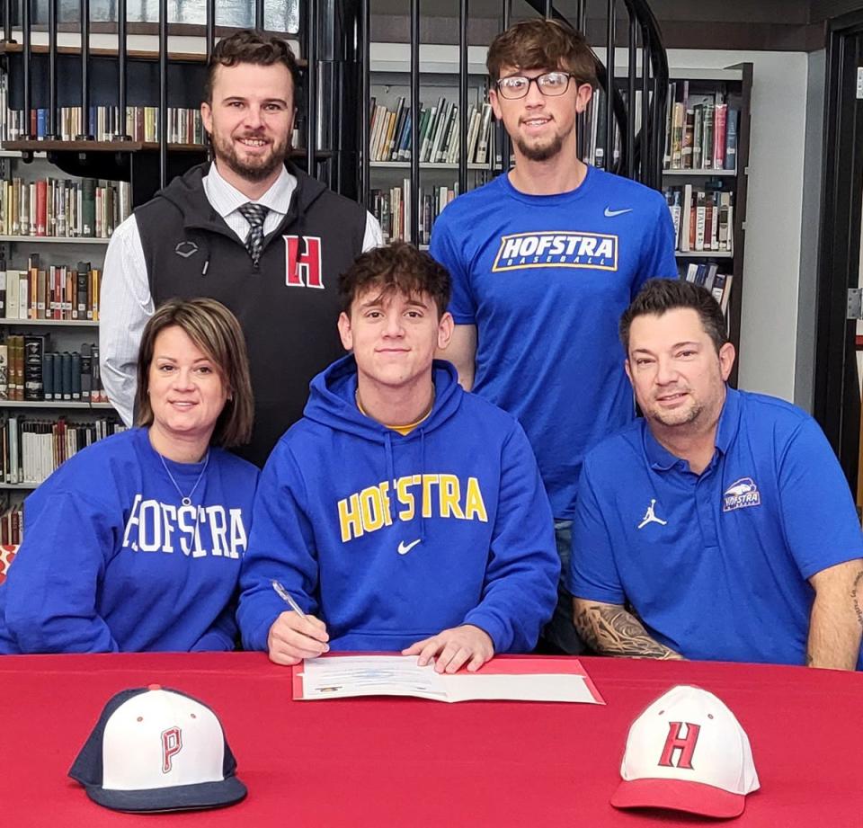 Honesdale baseball standout Joseph Curreri has announced that he will be continuing his academic and athletic career at Hofstra University. The fireballing senior right-hander is pictured here signing his Letter of Intent with (seated, from left): Parents Carolyn and Joe Curreri. Standing. Head Coach Ernie Griffis, Brother David Curreri.