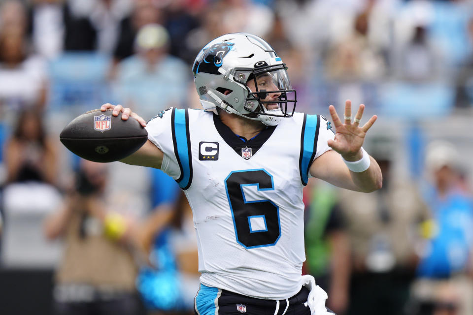 Carolina Panthers quarterback Baker Mayfield (6) sets back to pass during the first half of an NFL football game against the New Orleans Saints, Sunday, Sept. 25, 2022, in Charlotte, N.C. (AP Photo/Jacob Kupferman)