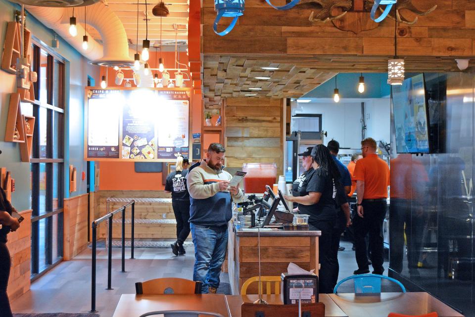 Tacos 4 Life, a new fast-casual, Tex-Mex fusion chain, is open for business on Green Meadows Road. Opening day was Tuesday.