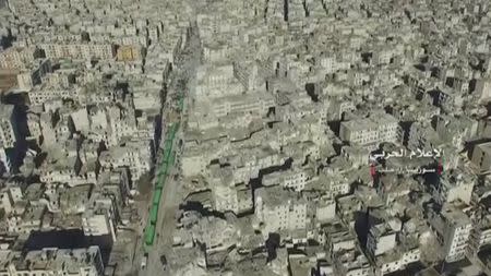 A still image from video taken December 15, 2016 over eastern Aleppo shows an operation to evacuate thousands of civilians and fighters in buses from Aleppo, Syria Syrian Army/Handout via Reuters TV