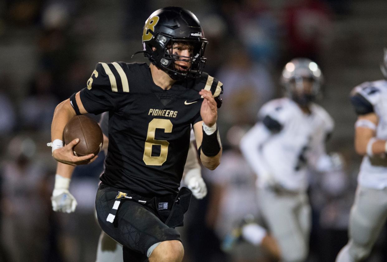 Boonville’s Clay Conner (6) carries the ball as the Boonville Pioneers play the Reitz Panthers at Bennett Field in Boonville, Ind., Friday evening, Oct. 22, 2021. 