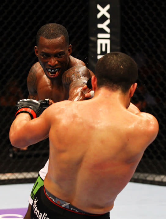 ATLANTA, GA - APRIL 21: Anthony Njokuani (back) punches John Makdessi during their lightweight bout for UFC 145 at Philips Arena on April 21, 2012 in Atlanta, Georgia.