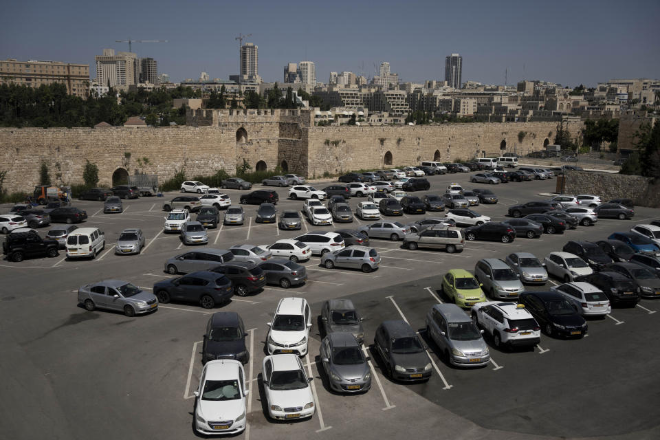 A general view of a parking lot that is part of a contentious deal in the Armenian Quarter in the Old City of Jerusalem, Tuesday, May 30, 2023. The 99-year lease of some 25% of Jerusalem's Armenian Quarter has touched sensitive nerves in the Holy Land and sparked a controversy extending far beyond the Old City ramparts. (AP Photo/ Maya Alleruzzo)