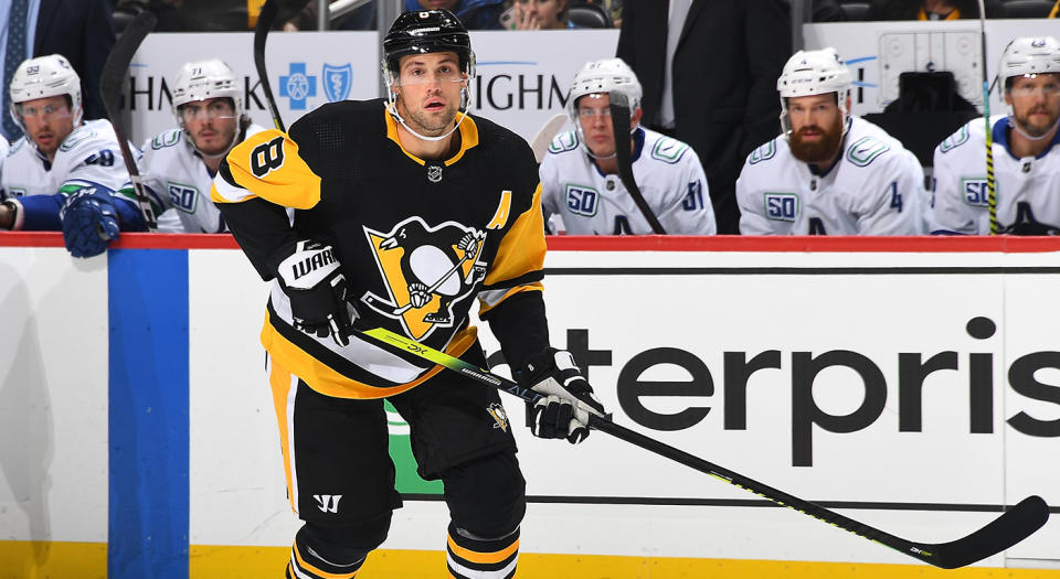 PITTSBURGH, PA - NOVEMBER 27: Brian Dumoulin #8 of the Pittsburgh Penguins skates against the Vancouver Canucks at PPG PAINTS Arena on November 27, 2019 in Pittsburgh, Pennsylvania. (Photo by Joe Sargent/NHLI via Getty Images) 