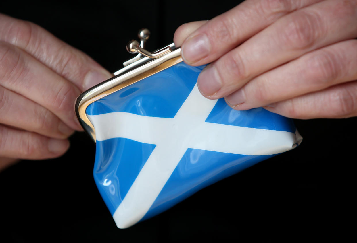 The Scottish Government is seeking to make up to £500 million of ‘direct savings’ MSPs were told (Jane Barlow/PA)